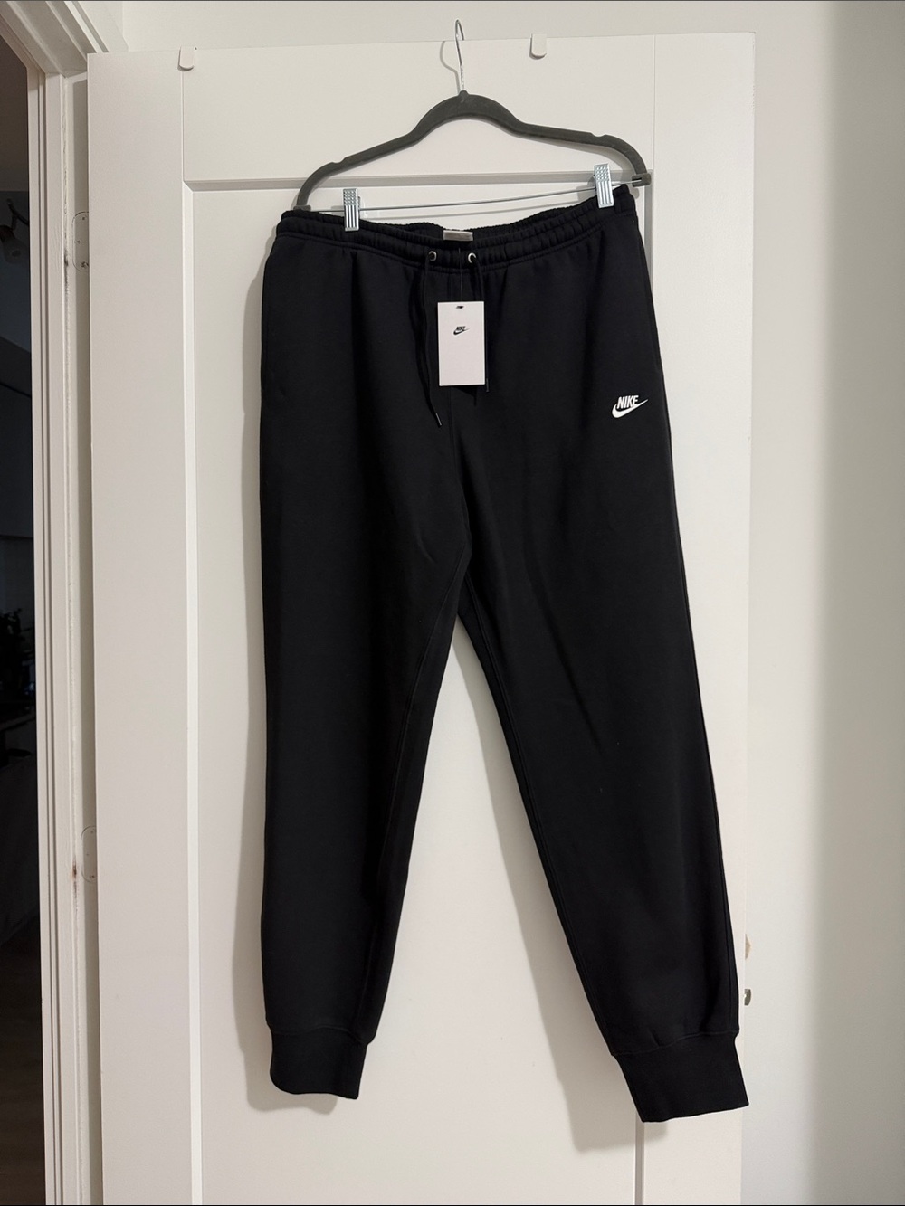Nike Black Sweatpants with White Swoosh Logo